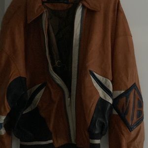 Brown varsity jacket
